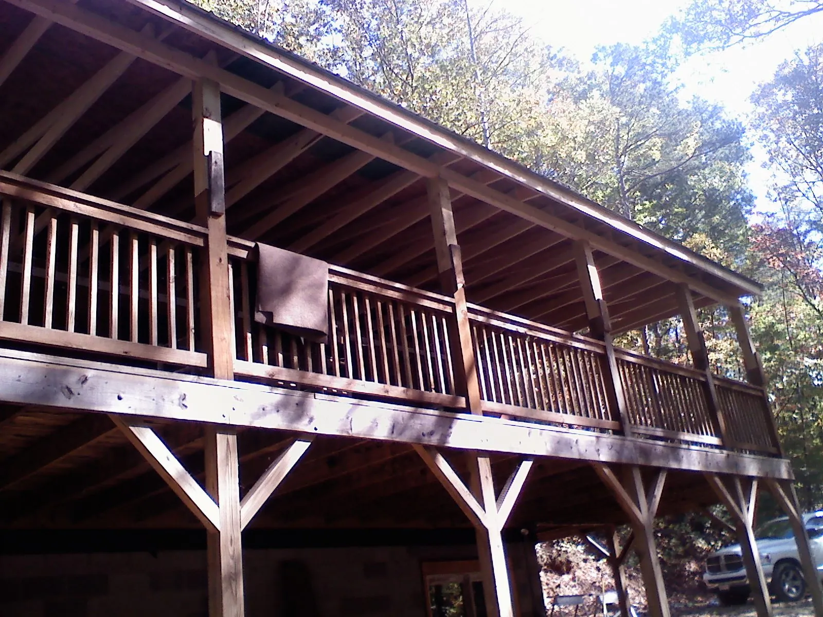 Timber framing under a new elevated porch and deck — Roof Leak Repair in Ackworth by Roofing Brothers